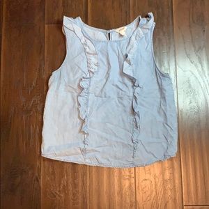 Ruffle sleeveless denim shirt